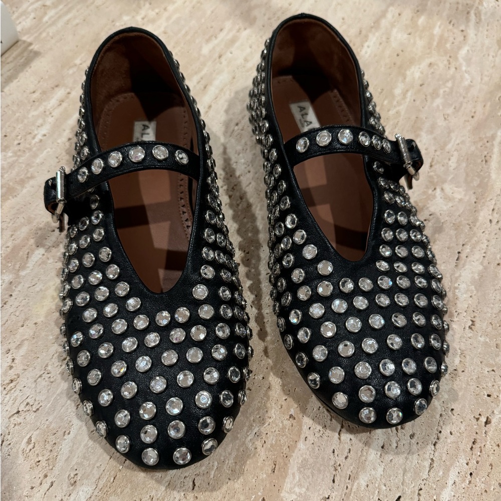 ALAÏA STUDDED BALLERINA FLATS BLACK